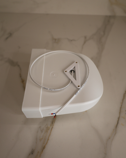 Top view of GRATKA SLIM 125 housing with power cable and flat 60x204 mm duct outlet for drywall installation